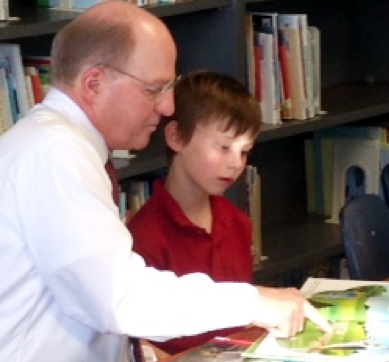 Ward Reading to a Child