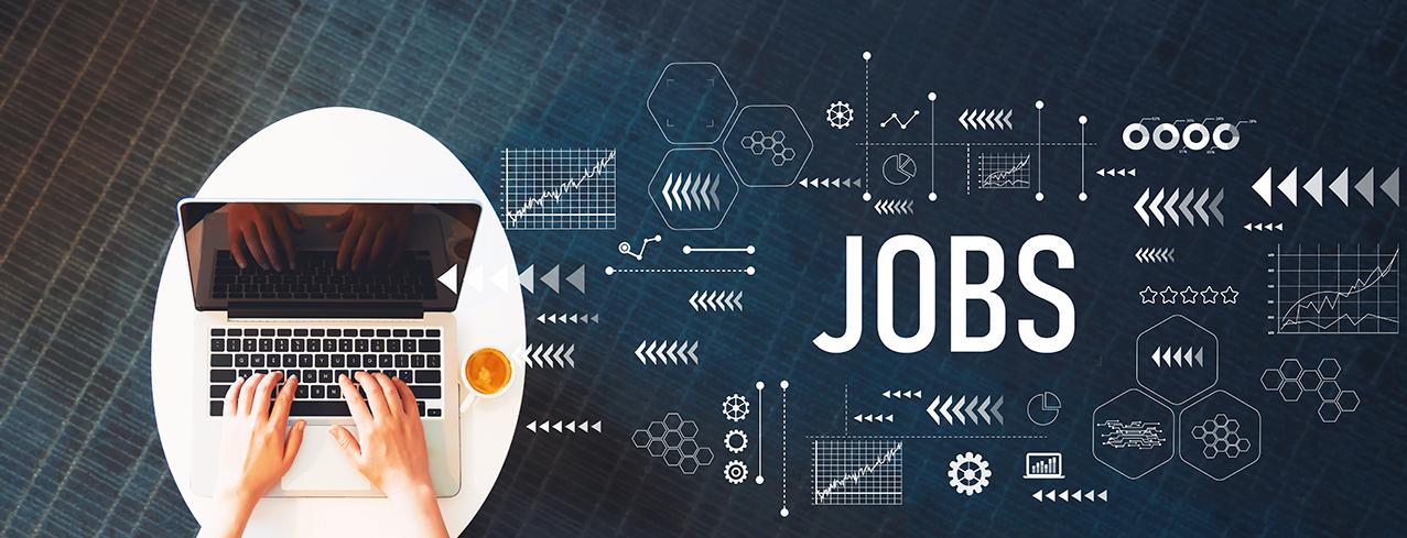 Employment header image Graphic titled "Jobs" with person at a laptop