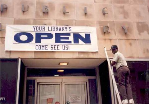 Billy Loudermilk Hangs Sign Announcing the Reopening of the Downtown Library after the Federal Building Bombing Billy Loudermilk Hangs Sign Announcing the Reopening of the Downtown Library after the Federal Building Bombing
