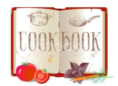 Cookbook open with vegetables