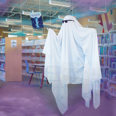 Ghost with floating book in library