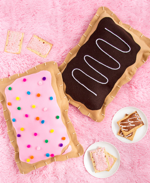 Image of pink and brown pillows that look like Pop Tarts