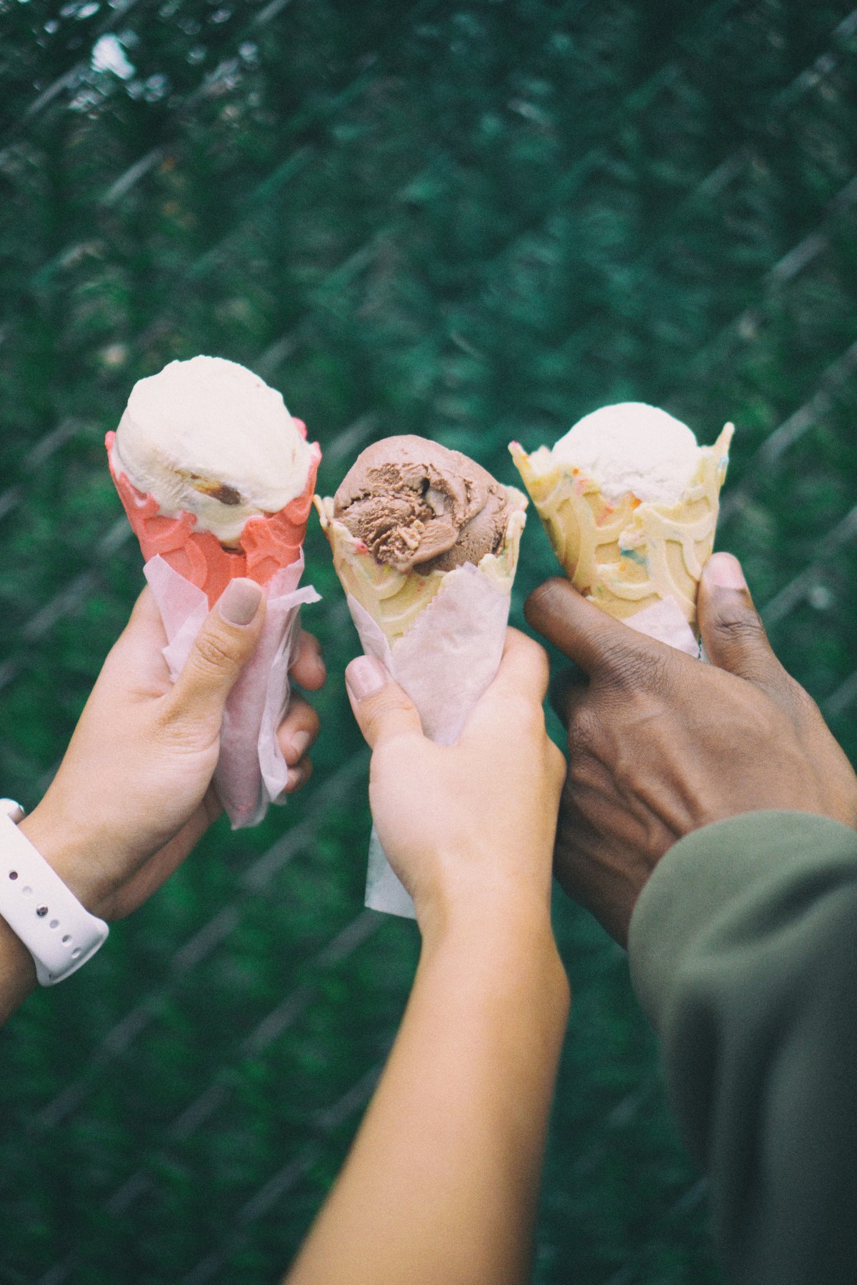 Hands holding ice cream