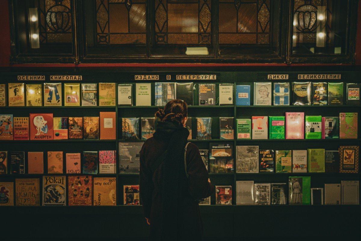 Guest browses book collection